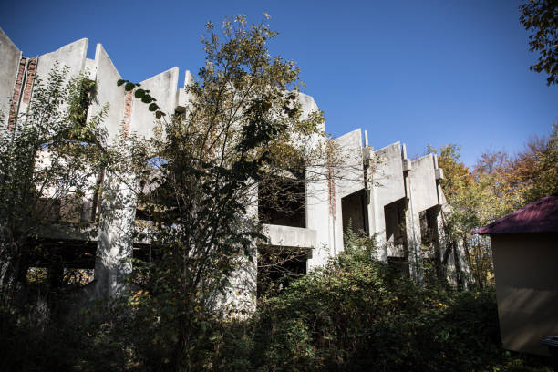 istock Autumn forest and old soviet building. Azerbaijan Ganja 1183738786