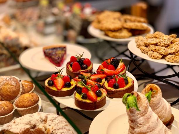 istock cakes in a shop window 1183739606