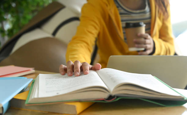 istock Students are reading books and taking notes for exam preparation. 1183741029