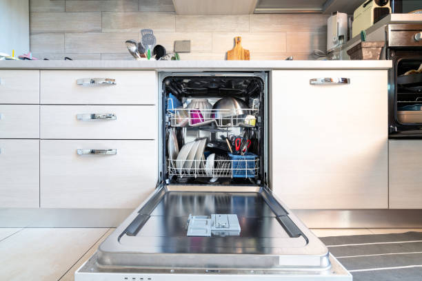 istock Opened dishwasher with clean dishes 1183742782