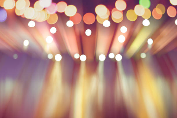 blurred lights on stage, abstract image of colourful lighting, background party blur celebration concept. - music club imagens e fotografias de stock