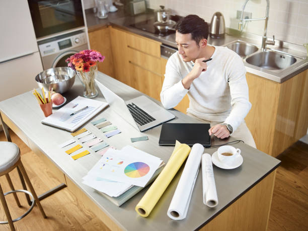 young asian designer working from home