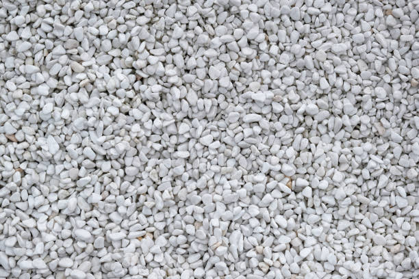 istock Decorative stone building pebbles close-up macro photo stone designer background. 1183745215