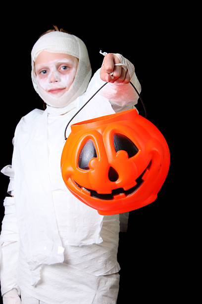 istock trick or treat mummy 118374567