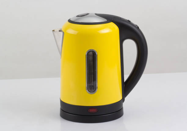 istock modern yellow electric kettle isolated 1183746289
