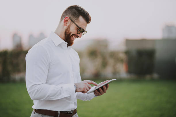 istock Businessman working on digital tablet 1183747189