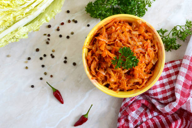 Braised cabbage from tomato sauce on a table. Lenten menu. Diet low-calorie vegetable dish. The top view