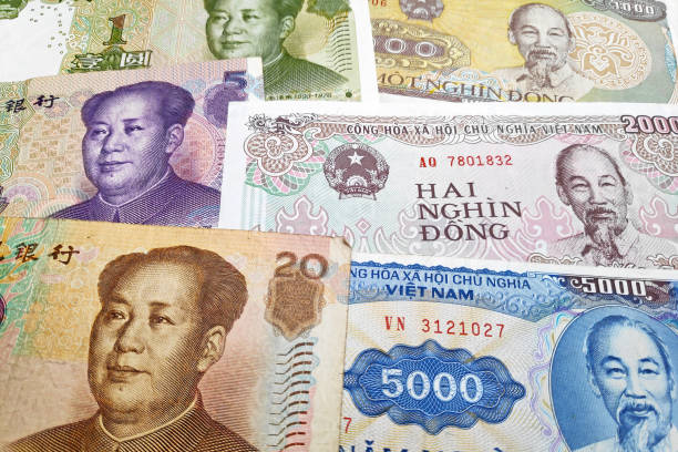 istock Stack of Chinese Renminbi & Vietnamese Dong 1183749546