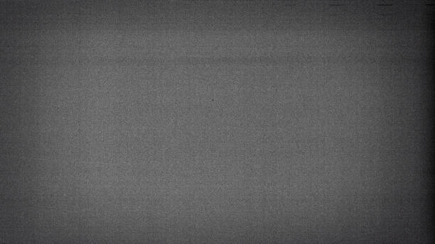 istock Noisy film frame with heavy noise, dust and grain 1183750499