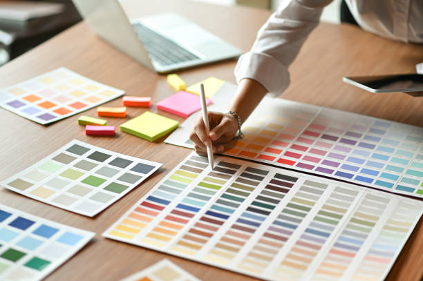 istock The architect is comparing the color chart and using the tablet. 1183751524