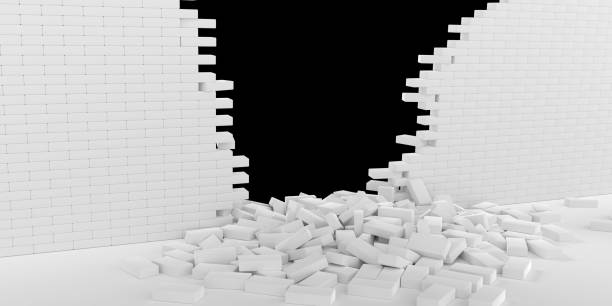 istock 3D rendering Destruction of a white brick wall on black background 1183758065