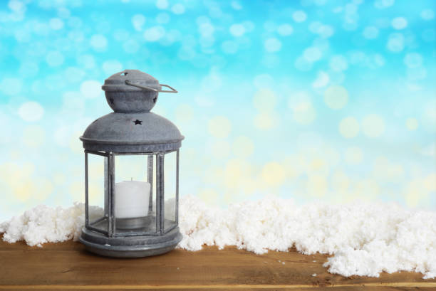 istock christmas background with lantern and snow 1183759596