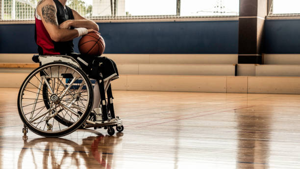 istock Paraplegic basketball player holding a ball 1183759618