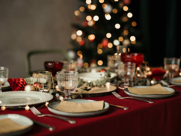 istock Christmas table place setting prepared for dinner party 1183761348