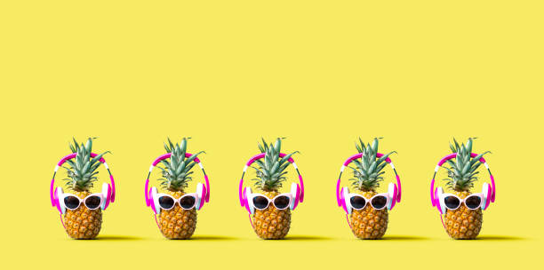 istock Pineapples wearing headphones 1183761536
