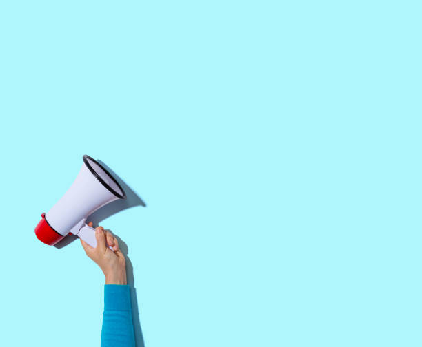 istock Person holding a megaphone 1183761616