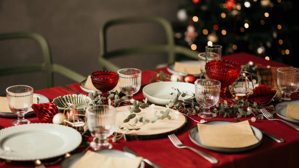 istock Christmas table place setting prepared for dinner party 1183761934