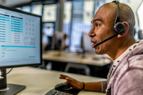 istock Call centre employee talking to customer 1183762851