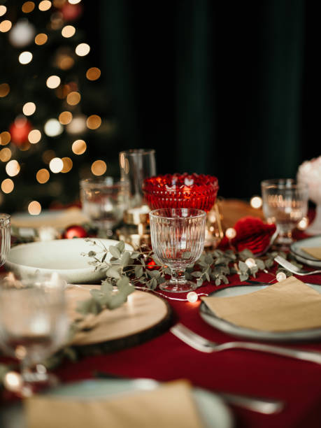 istock Christmas table place setting prepared for dinner party 1183764243