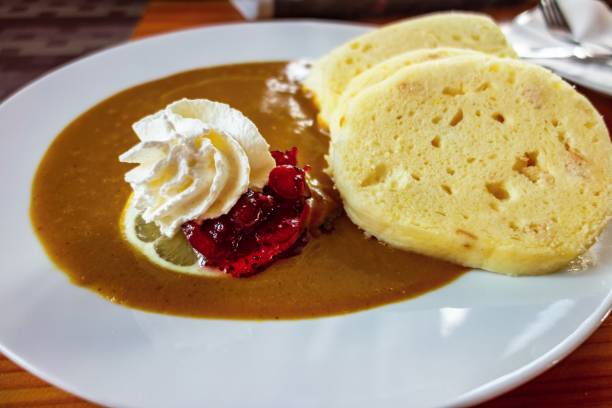 istock Sirloin sauce, whipped cream, dumplings. 1183764451