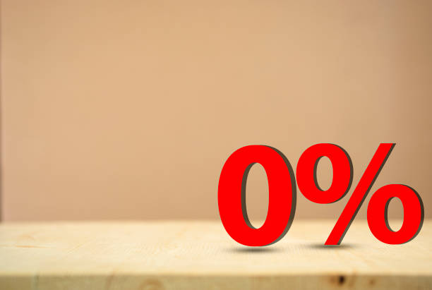 Red 0 % for special Offer or zero percent on wooden background with copy space.