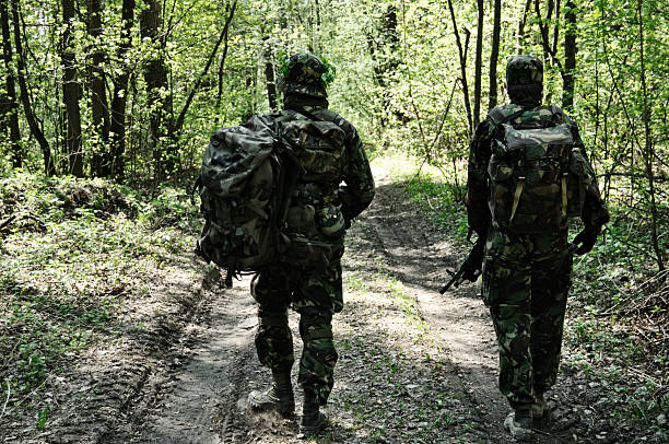 istock soldiers in a forest 118377083