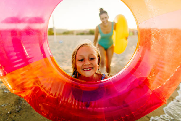 istock With mommy at the beach 1183774535