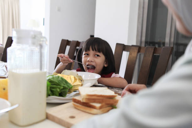 istock A Little Girl Is Having A Breakfast 1183775351