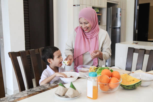 istock A Boy Having A Breakfast Prepared By His Grandmother 1183775392