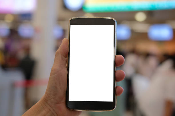 istock hand holding mobile smart phone at airport 1183780425