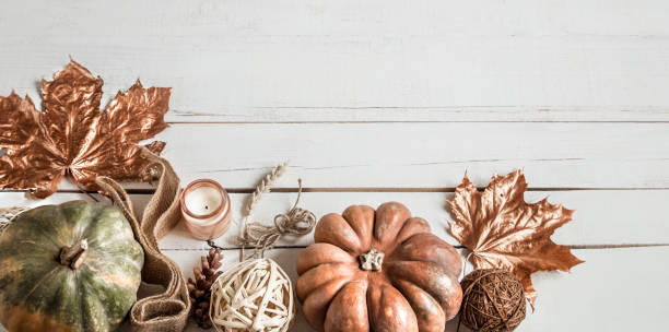 istock Autumn background with decorative items and pumpkin. 1183780722