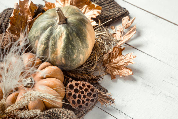 istock Autumn background with decorative items and pumpkin. 1183780727