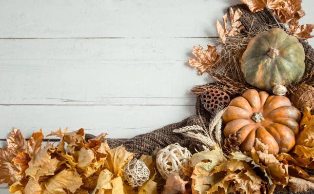 istock Autumn background with decorative items and pumpkin. 1183780733