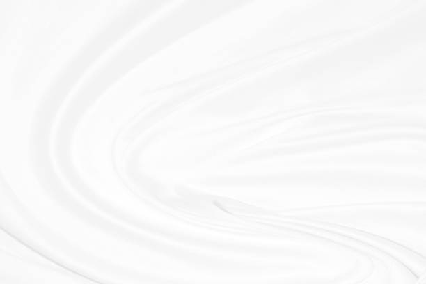 istock fabric  white soft cloth.  Abstract waves curves shape background 1183782298