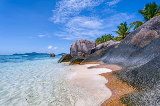 istock Beautiful tropical beach Anse Source d´Argent with sculpted granite rocks and palm trees - La Digue . Island of La Digue, Seychelles, Indian Ocean Islands. 1183782570