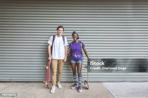 Skaters Training In A Skate Park In New York Stock Photo - Download Image Now - African-American Ethnicity, Outdoors, Teenager