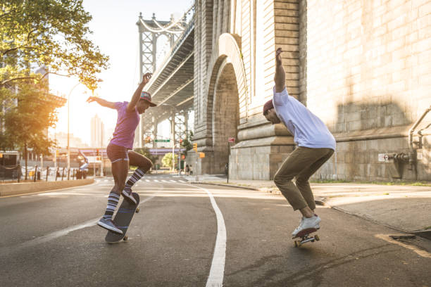 istock Skaters training in a skate park in New York 1183786269