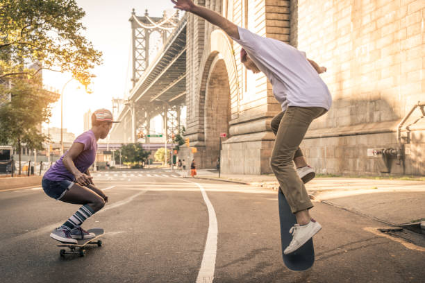 istock Skaters training in a skate park in New York 1183786310