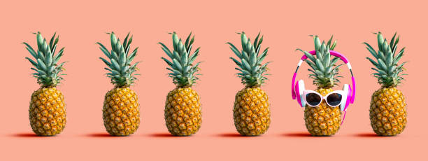 istock One out unique pineapple wearing headphones 1183792130