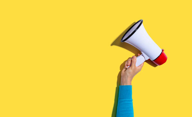 istock Person holding a megaphone 1183792196