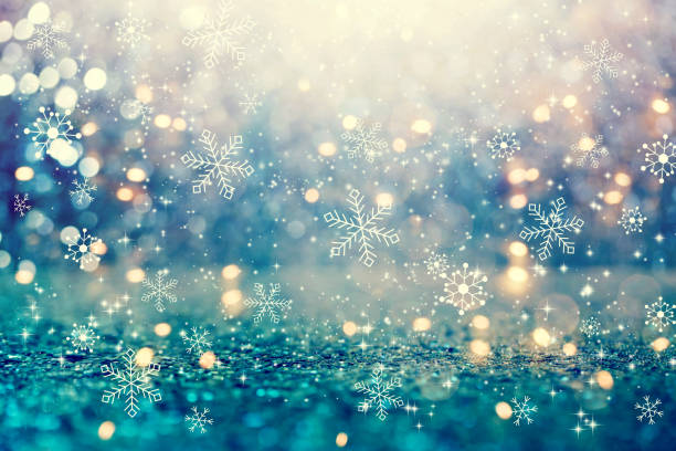 Snowflakes on an abstract shiny light background