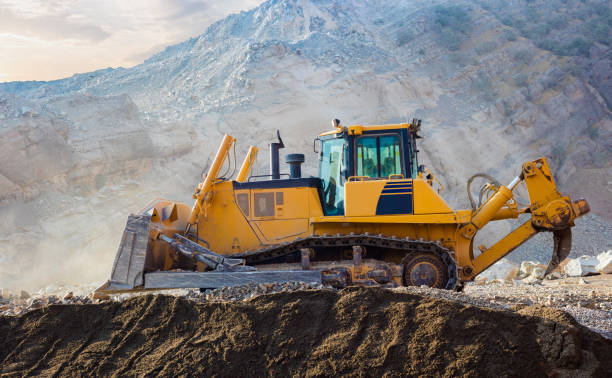 istock Bulldozer digging up the earth 1183793798