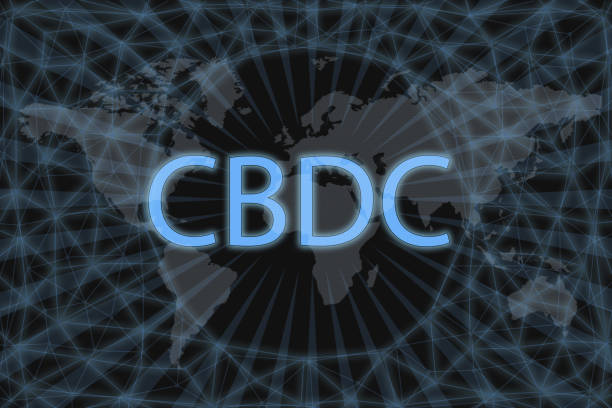 istock CBDC (Central Bank Digital Currency) Abstract Cryptocurrency. With a dark background and a world map. Graphic concept for your design. 1183794137