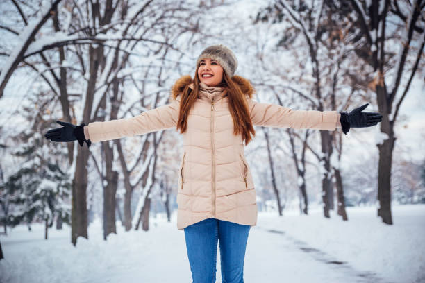 istock Young woman enjoying in winter 1183798819