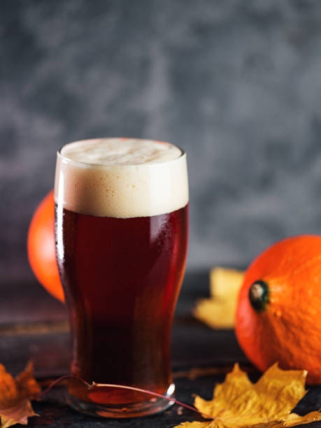 istock Pumpkin beer red ale glass on the table 1183800215