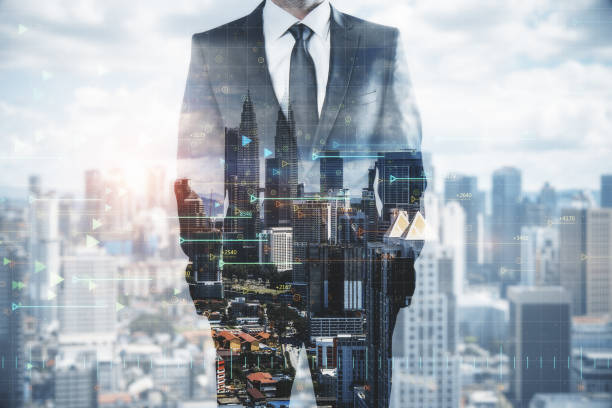 istock Businessman in tech city 1183802685