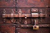 Closed wooden lock red wooden door security