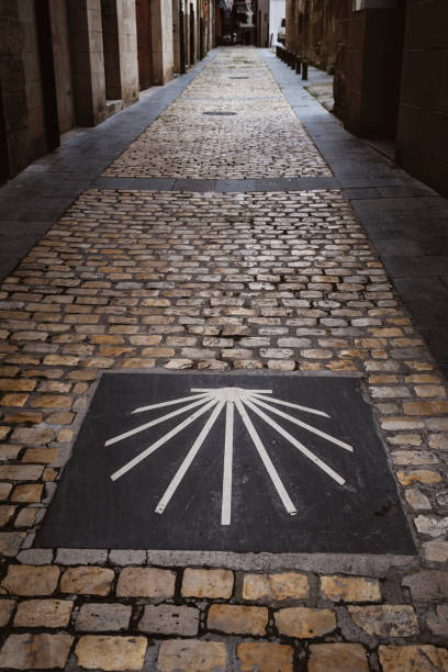 A Camino symbol is seen on a stone street that is part of the route of the Camino de Santiago as it passes through the town of Logrono, the capital of La Rioja in Spain.