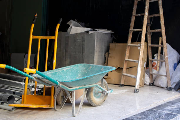 istock Construction with wheelbarrow and stairs. Building site and constructional materials 1183809013