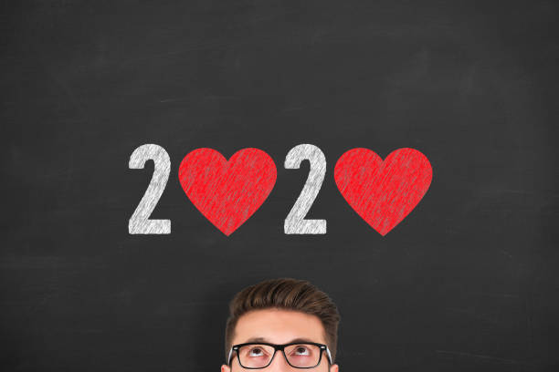 istock New Year 2020 with Heart Shape on Chalkboard Background 1183811123
